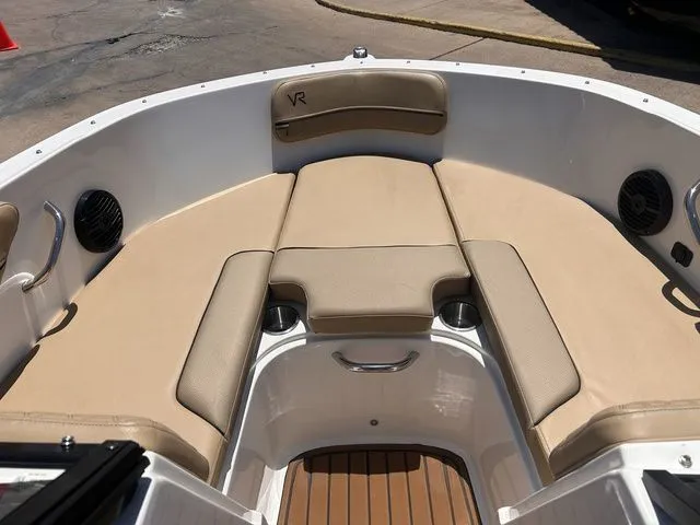 Slide: The Image of Interior view of 2022 Bayliner VR4 Bowrider with beige seating. - 12