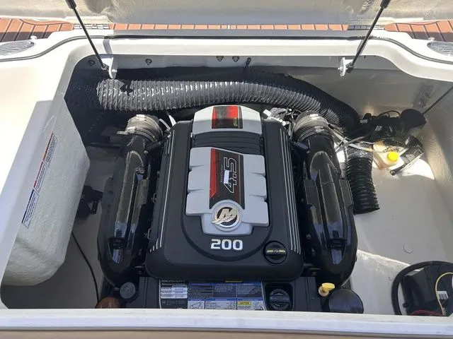 Slide: The Image of Engine compartment of 2022 Bayliner VR4 BOWRIDER with 200 HP engine. - 16