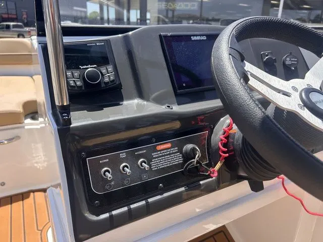 Slide: The Image of 2022 Bayliner VR4 Bowrider dashboard with modern controls. - 18