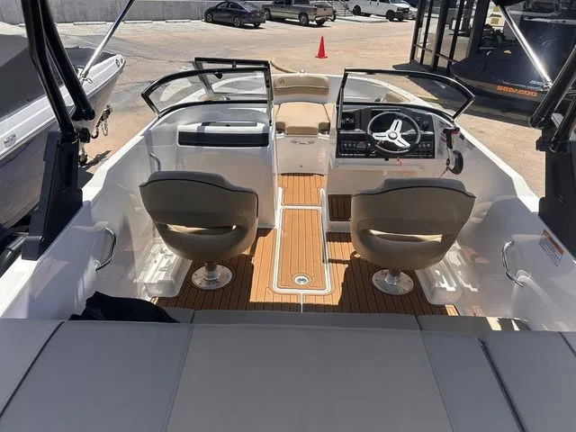 Slide: The Image of Interior view of 2022 Bayliner VR4 Bowrider with two seats and steering console. - 8