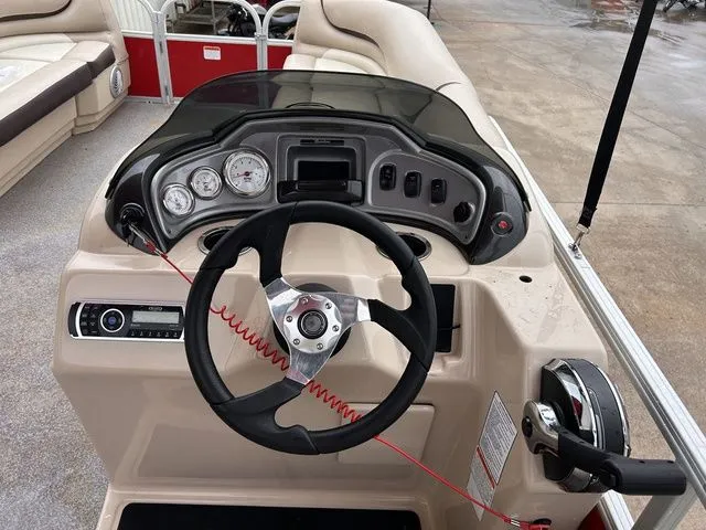 Slide: The Image of Dashboard of a 2016 Sun Tracker Party Barge 20 DLX pontoon boat. - 15