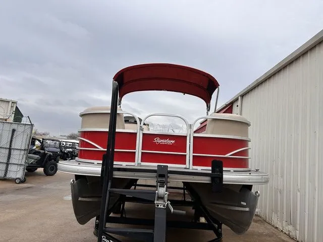 Slide: The Image of 2016 Sun Tracker Party Barge 20 DLX pontoon boat with red canopy. - 8