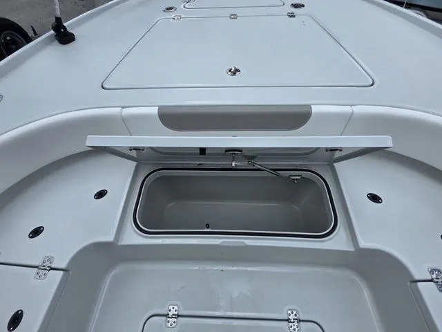 Slide: The Image of Interior view of 2025 Caymas 26 HB boat storage compartment. - 16
