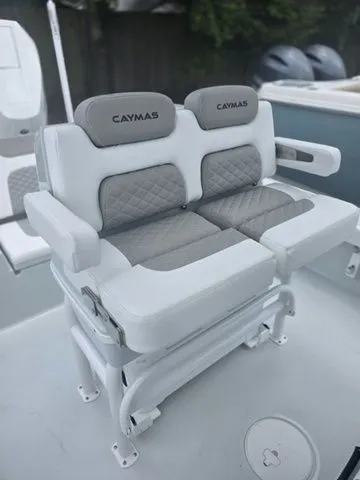 Slide: The Image of 2025 Caymas 26 HB boat seat with gray and white upholstery. - 37