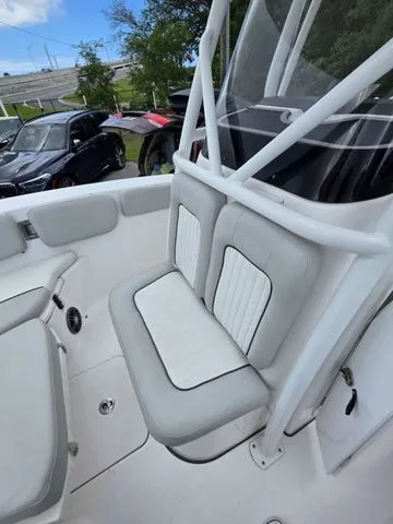 Slide: The Image of 2023 Sea Fox 228 Commander boat seat with white upholstery. - 11