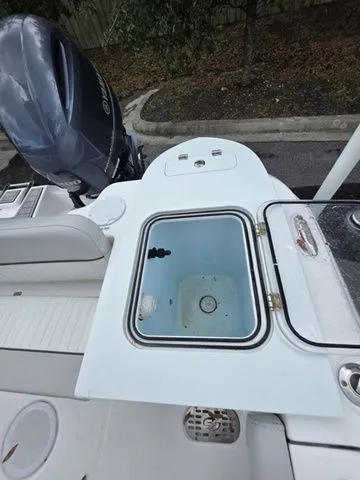 Slide: The Image of 2023 Sea Fox 228 Commander boat with open storage compartment. - 14