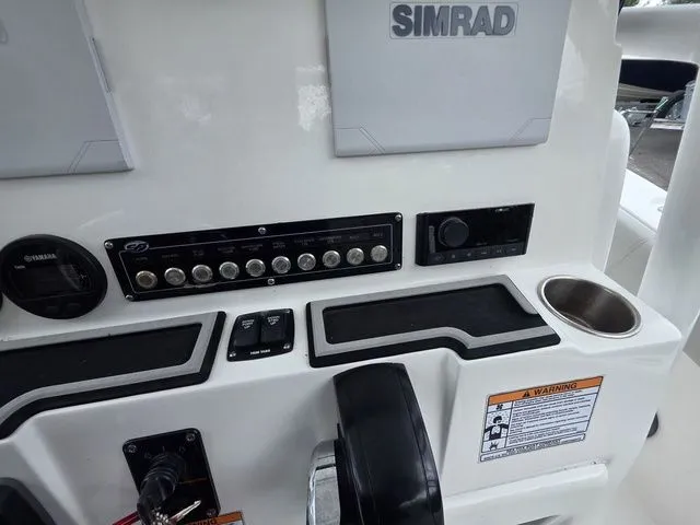 Slide: The Image of Dashboard of 2023 Sea Fox 228 Commander with Simrad system. - 16
