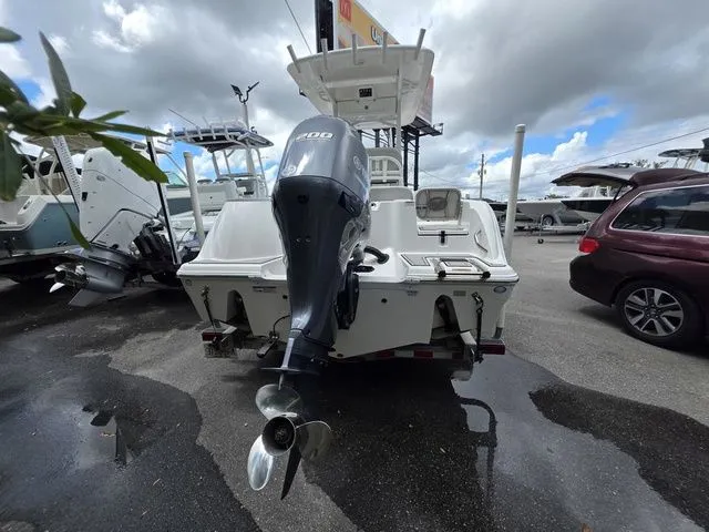 Slide: The Image of Rear view of a 2023 Sea Fox 228 Commander boat outdoors. - 3