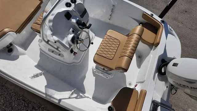 Slide: The Image of Interior of ALK2 Powerboats 18CRS 2026 with beige seating. - 11