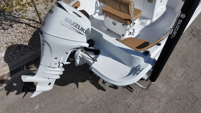 Slide: The Image of ALK2 Powerboats 18CRS 2026 with Suzuki outboard motor, rear view. - 13