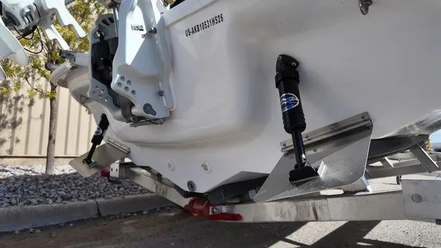 Slide: The Image of Rear view of a 2026 ALK2 Powerboats 18CRS on a trailer. - 16