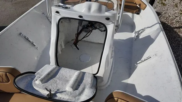 Slide: The Image of 2026 ALK2 Powerboats 18CRS interior view, white and brown seating. - 24
