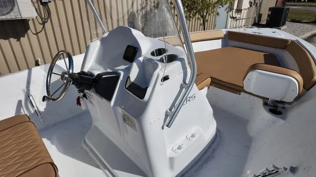 Slide: The Image of ALK2 Powerboats 18CRS 2026 helm with brown seating. - 25