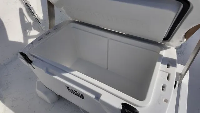 Slide: The Image of Open cooler on an ALK2 Powerboats 18CRS, year 2026. - 28