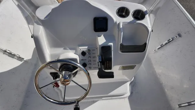 Slide: The Image of ALK2 Powerboats 18CRS 2026 helm with steering wheel and controls. - 3