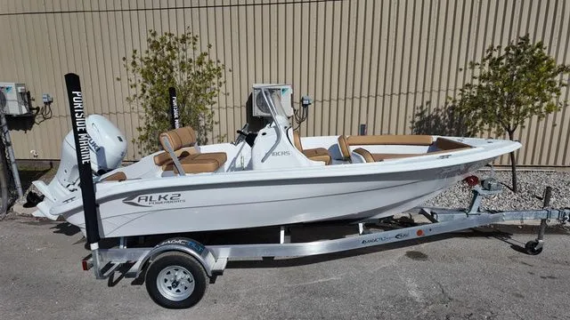Slide: The Image of 2026 ALK2 Powerboats 18CRS on trailer, white design. - 5