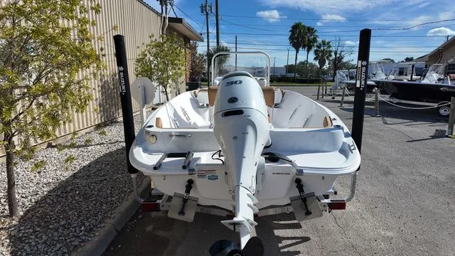 Slide: The Image of ALK2 Powerboats 18CRS 2026 with outboard motor, parked in a lot. - 6