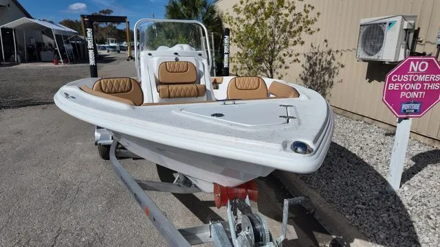 Slide: The Image of ALK2 Powerboats 18CRS 2026 on trailer, white design, brown seats. - 7