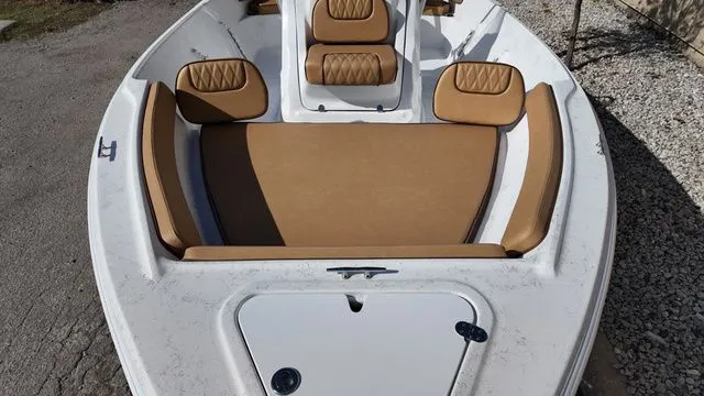 Slide: The Image of ALK2 Powerboats 18CRS 2026 with brown seats and white deck. - 9