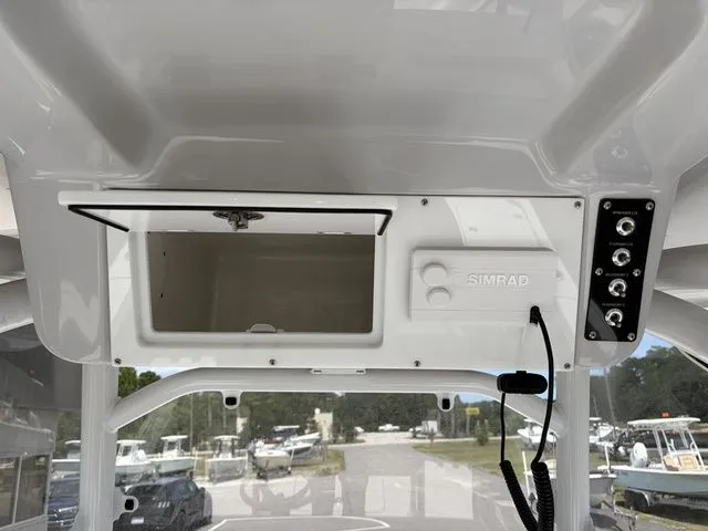 Slide: The Image of Interior view of 2026 Sea Pro 250 Bay Boat with Simrad system. - 10