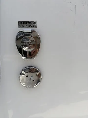 Slide: The Image of Non-potable fresh water connection on 2026 Sea Pro 250 Bay Boat. - 14