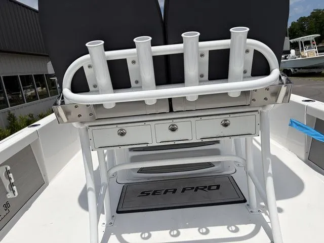 Slide: The Image of 2026 Sea Pro 250 Bay Boat with rod holders and storage. - 17