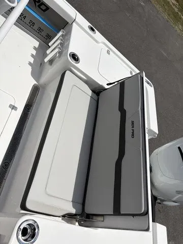 Slide: The Image of 2026 Sea Pro 250 Bay Boat seating and storage area. - 19