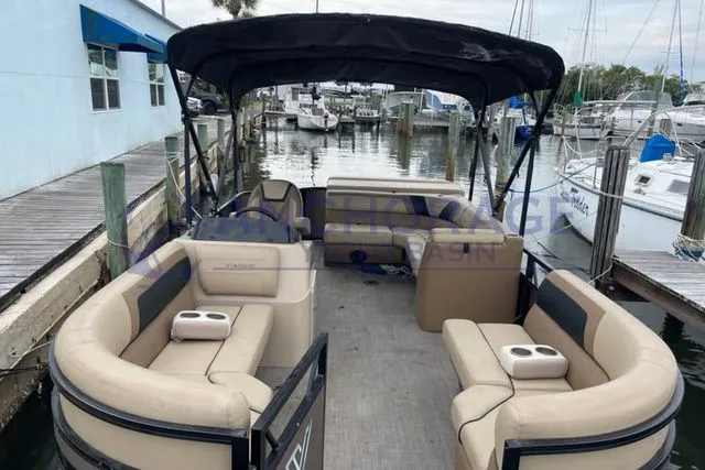 Slide: The Image of 2021 VIAGGIO Lago C L20C pontoon boat at dock. - 8