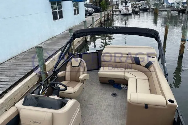 Slide: The Image of 2021 Viaggio Lago C L20C pontoon boat docked. - 9