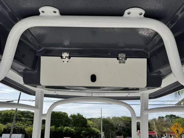 Slide: The Image of Robalo R222 Explorer 2022 boat roof with storage compartment. - 10