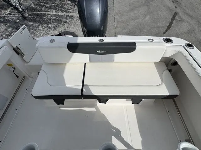 Slide: The Image of Robalo R222 Explorer 2022, seating area in boat hull. - 11