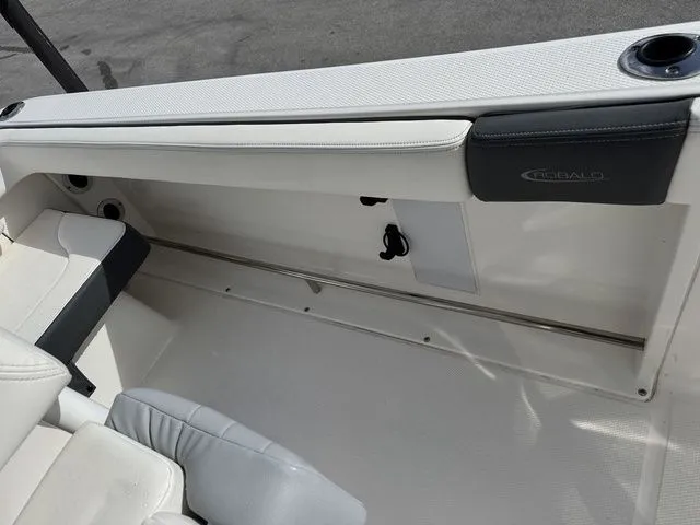 Slide: The Image of Interior of 2022 Robalo R222 Explorer with seating area. - 13