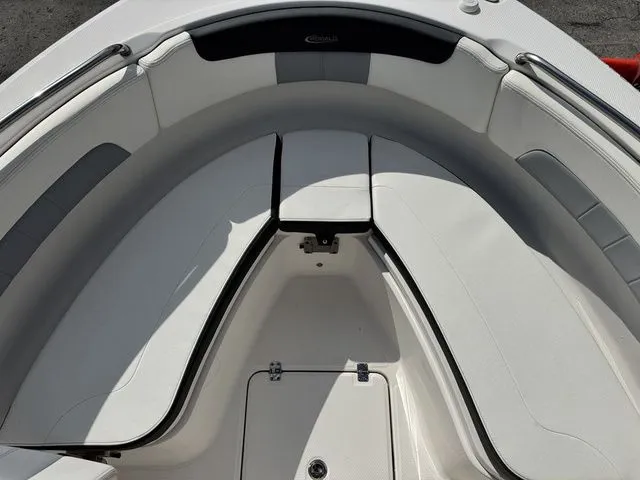 Slide: The Image of Interior view of 2022 Robalo R222 Explorer boat, white upholstery. - 18