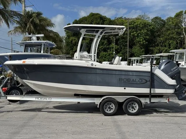 Slide: The Image of 2022 Robalo R222 Explorer boat on trailer, side view. - 3