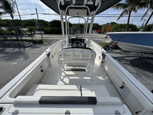 Slide: The Image of Interior view of a 2022 Robalo R222 Explorer boat at the dock. - 5