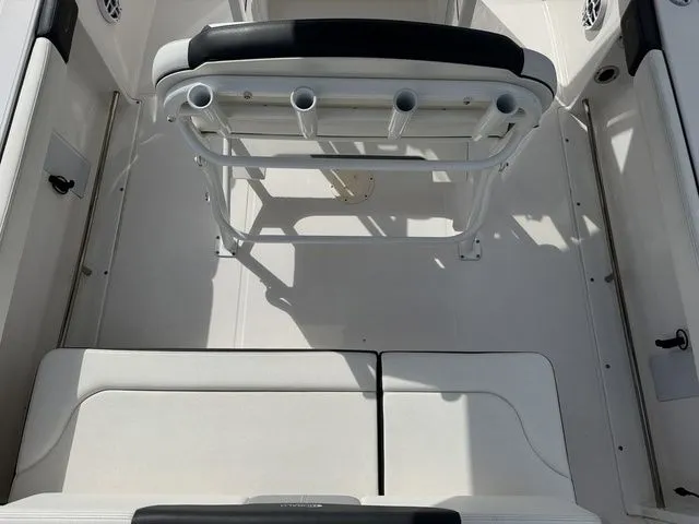 Slide: The Image of Interior of 2022 Robalo R222 Explorer with seating and rod holders. - 7