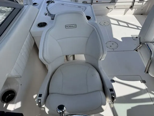 Slide: The Image of White seat on a 2012 Robalo 247 DC boat. - 17