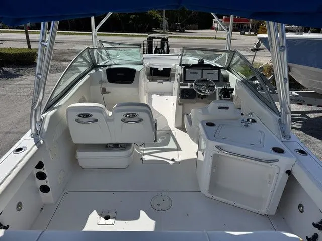 Slide: The Image of Interior view of a 2012 Robalo 247 DC boat with helm station. - 7