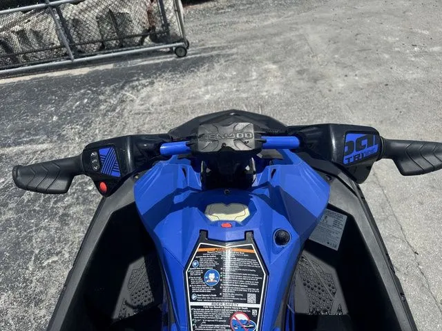 Slide: The Image of 2023 Sea-Doo Spark Trixx 2-up handlebar view, blue design. - 10