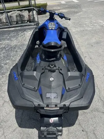 Slide: The Image of 2023 Sea-Doo Spark Trixx 2-up jet ski in blue and black. - 8