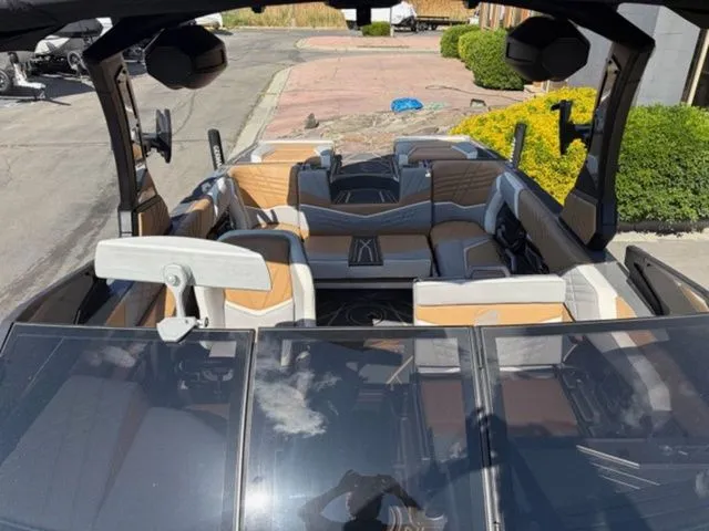Slide: The Image of Interior view of 2024 Tigé 23ZX boat with luxurious seating. - 6