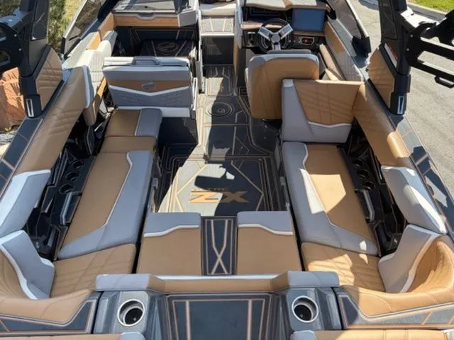 Slide: The Image of Interior of 2024 Tigé 23ZX with luxurious seating and modern design. - 7