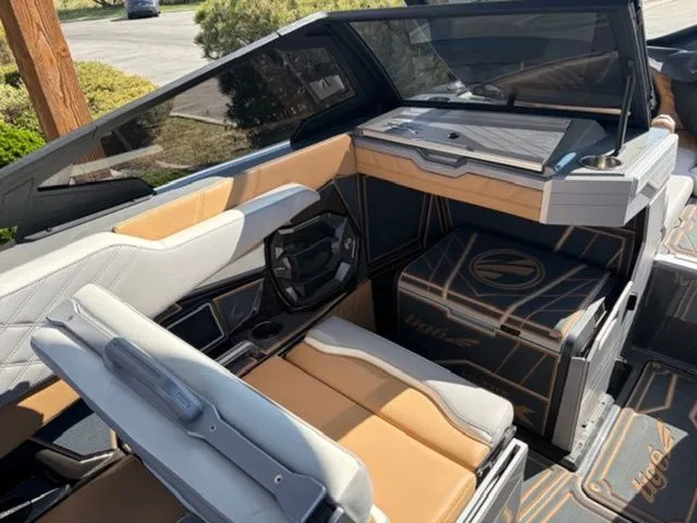 Slide: The Image of Interior of 2024 Tigé 23ZX boat with luxurious features. - 8
