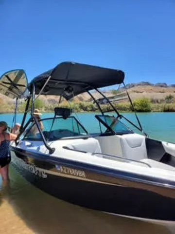 Slide: The Image of 2003 Centurion Avalanche boat at lakeside on a sunny day. - 8