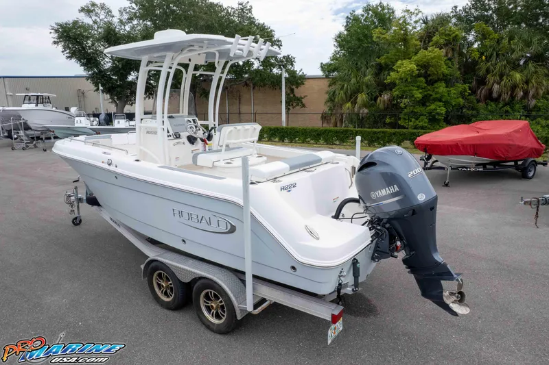 Slide: The Image of 2021 Robalo R222 Center Console boat with Yamaha engine on trailer. - 10