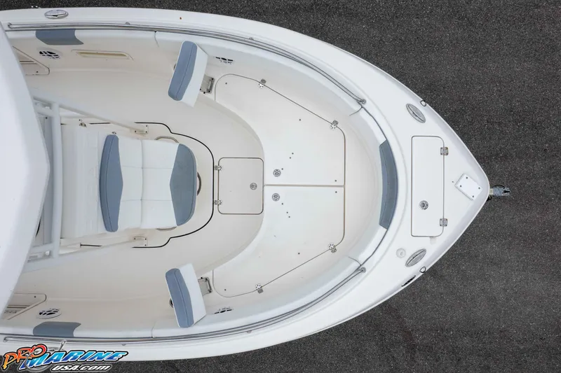 Slide: The Image of 2021 Robalo R222 Center Console boat, aerial view of bow seating and storage compartments. - 20