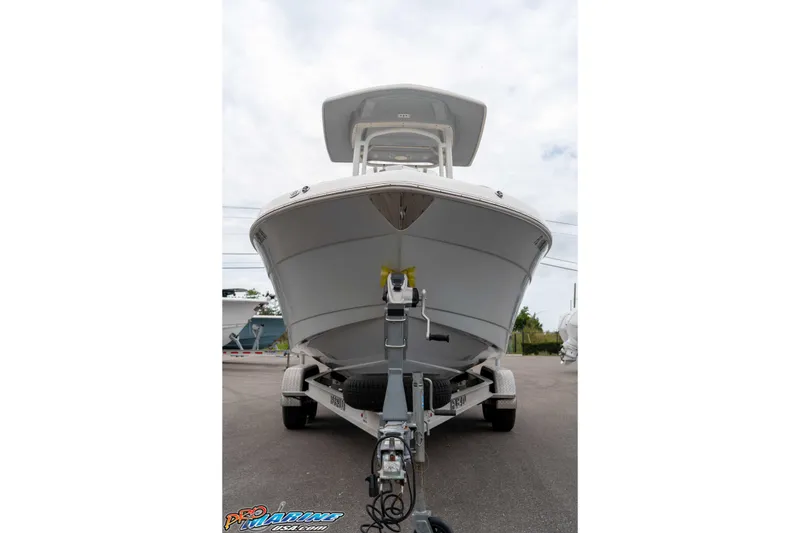 Slide: The Image of 2021 Robalo R222 Center Console boat on trailer, front view. - 28