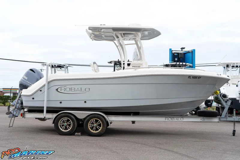 Slide: The Image of 2021 Robalo R222 Center Console boat on trailer, side view. - 36