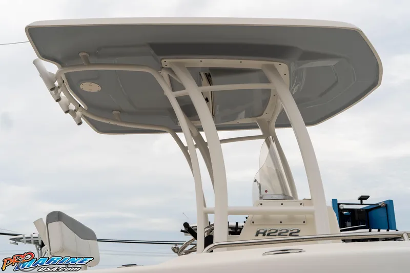 Slide: The Image of 2021 Robalo R222 Center Console boat with T-top and sleek design. - 37
