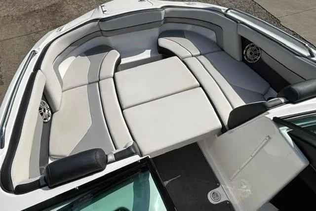 Slide: The Image of 2016 Yamaha Boats 212X interior with spacious seating and modern design. - 12